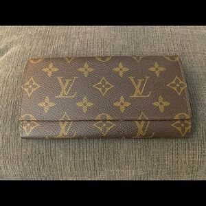 Louis Vuitton monogram porte credit long wallet.